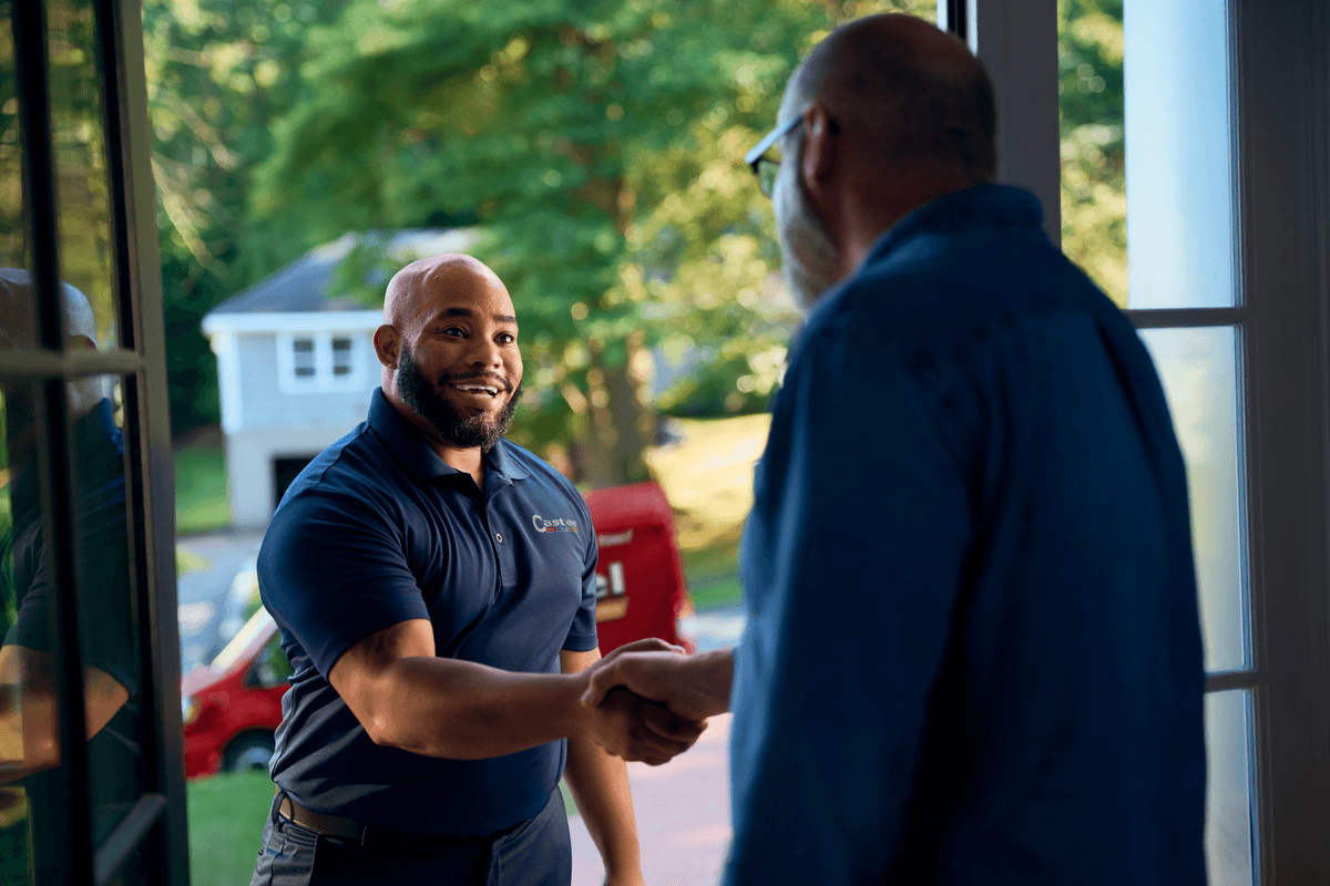 Technician shaking customers hand